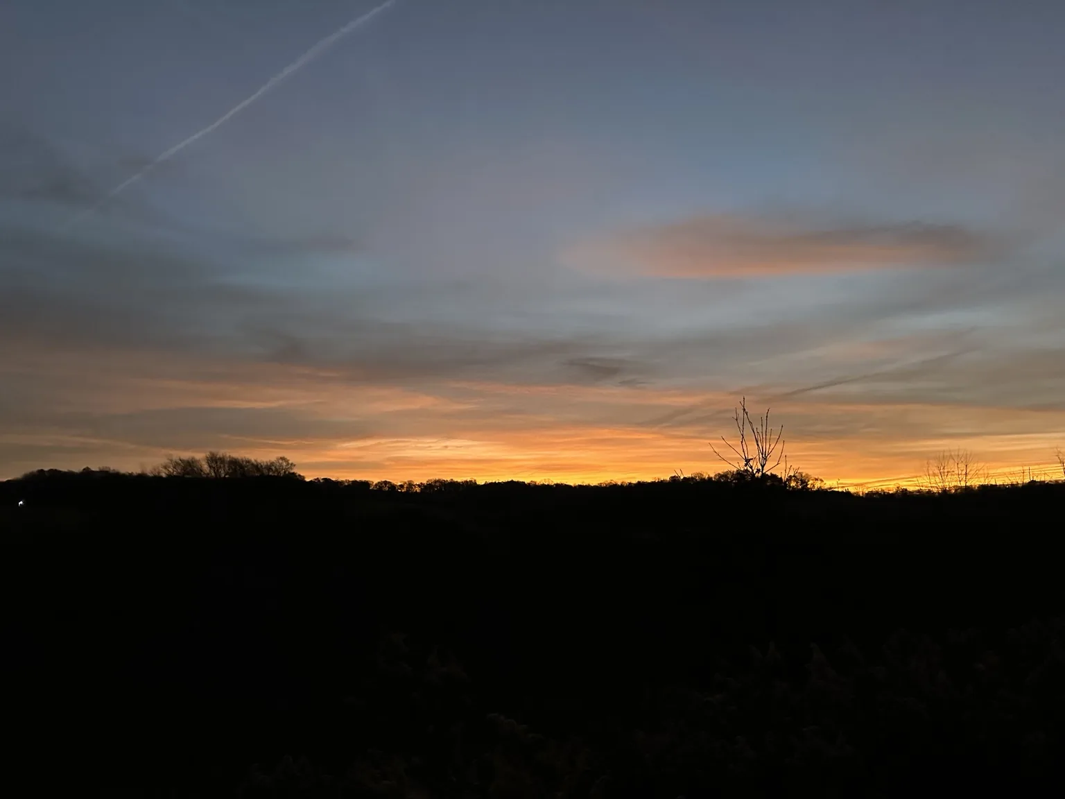 Warm sunset above the property